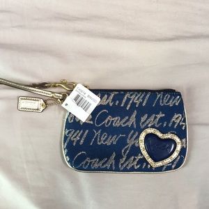 Never used coach wristlet with tag